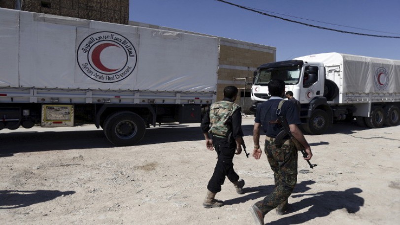 الهلال الأحمر السوري: توجه 100 شاحنة تحمل مساعدات إلى مناطق محاصرة