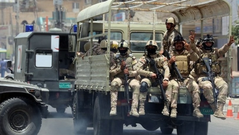عشرات القتلى بهجوم على مبنى سكني ببغداد