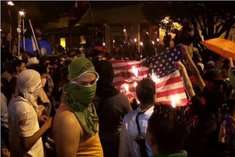 احتجاجات وحرق للعلم الأمريكي في العاصمة الهندوراسية