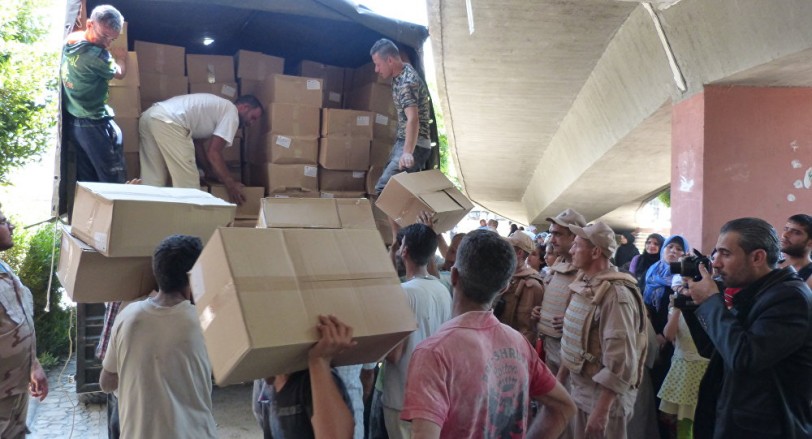 مساعدات إنسانية إلى دير الزور وحلب وريف حمص