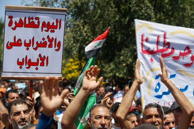 أزمة الأجور وإضراب العمال في العراق
