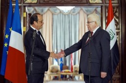 هولاند ومعصوم: لا بد من مواجهة تنظيم الدولة