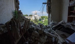 بوتين يؤكد لميركل وهولاند أهمية وقف إطلاق النار في أوكرانيا