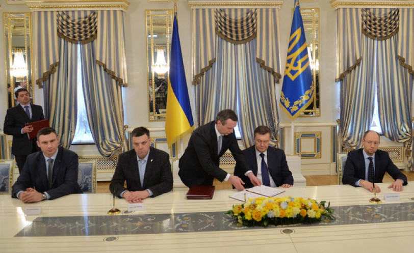 توقيع اتفاق تسوية الأزمة السياسية في أوكرانيا