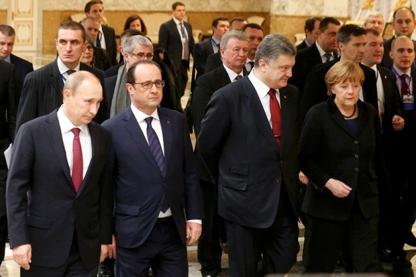 بوتين يناقش مع ميركل وبوروشينكو اتفاق هدنة