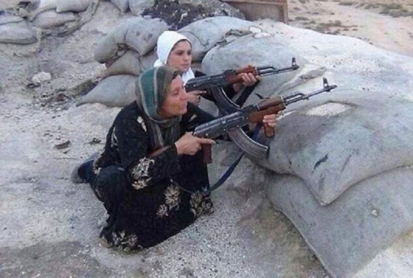 نساء وأطفال يقاتلون دفاعاً عن كوباني