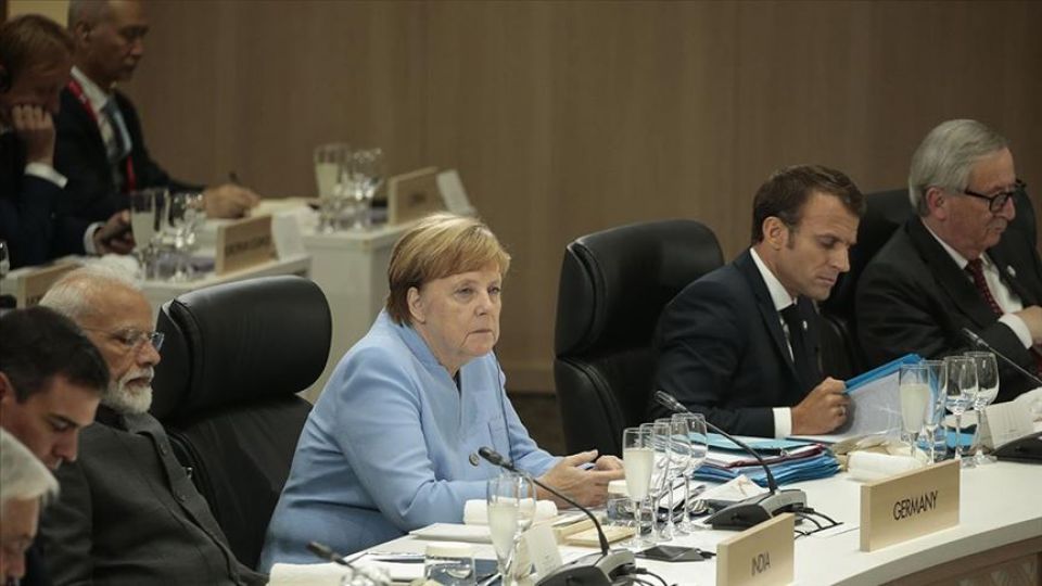 ميركل: قمة العشرين قد تساهم في حل النزاع التجاري بين واشنطن وبكين