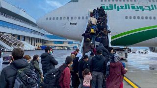 العراق ينجح باستعادة 617 لاجئاً عراقياً من حدود بولندا أغلبهم أطفال ونساء ومسنّون